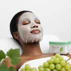 Black woman wearing white SKINFOOD Cica Daily Mask sheet mask, inclusive K-beauty spa routine — Glow Ritual
