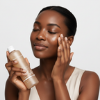 Black woman patting Blanc Nature 9X Heartleaf Calming Toner onto face, inclusive K-beauty routine — Glow Ritual
