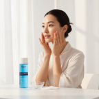 Asian woman applying Eucerin Dermo Repair Solution Toner on face, K-beauty hydrating routine — Glow Ritual
