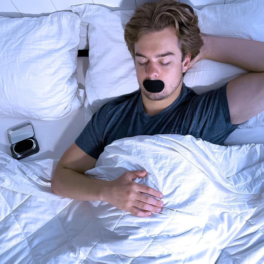 Man sleeping with Anti-Mouth-Opening Tape on lips — overnight mouth tape for nasal breathing and snoring reduction — Glow Ritual

