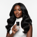 Refilled Hair Recovery Cytokine Booster Pro 70ml — Black woman with healthy voluminous hair holding frosted glass serum bottle with black cap, white studio background
