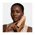 Black woman holding Blanc Nature 9X Heartleaf Calming Toner bottle, radiant skin K-beauty lifestyle — Glow Ritual
