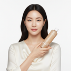 Asian woman holding Blanc Nature 9X Heartleaf Calming Toner bottle, K-beauty skincare lifestyle — Glow Ritual
