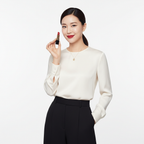 Refined Korean woman holding Chanel Rouge Coco lipstick with a confident smile — luxury cosmetics
