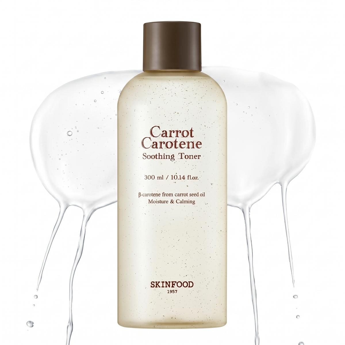 SKINFOOD Carrot Carotene Soothing Toner 300ml cream bottle with brown cap and watery toner splash on white background
