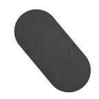 Anti-Mouth-Opening Tape single black oval patch close-up — non-woven hypoallergenic sleep tape — Glow Ritual


