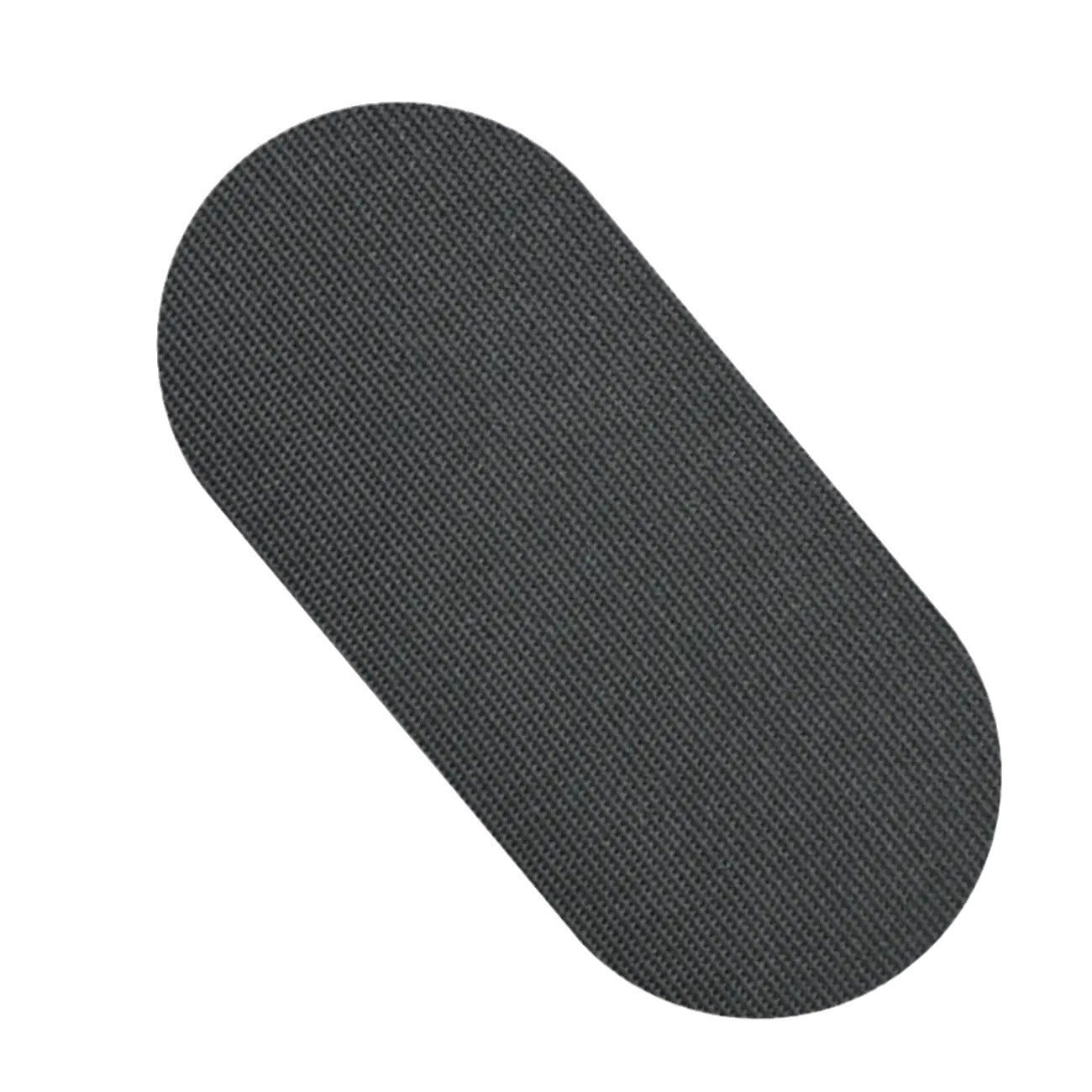 Anti-Mouth-Opening Tape single black oval patch close-up — non-woven hypoallergenic sleep tape — Glow Ritual


