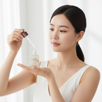 Korean woman applying SKINFOOD Carrot Carotene Moist Effector with open dropper, K-beauty routine — Glow Ritual

