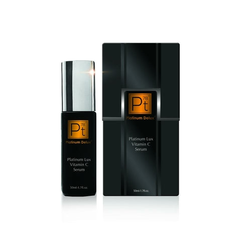 Platinum Lux Vitamin C Serum black and gold luxury bottle with silver cap and matching box, premium anti-aging brightening serum with Colloidal Platinum, Glow Ritual
