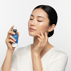 Young Korean woman applying peptide serum during morning skincare routine, dewy glass skin, K-beauty lifestyle — Glow Ritual
