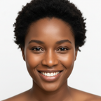 Black woman with natural hair showing radiant clear glowing skin after using Platinum Lux Vitamin C Serum, front-facing portrait, luminous even complexion, natural premium skincare result

