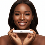 Black woman holding CLIO Kill Lash Mascara Remover white tube, K-beauty skincare editorial
