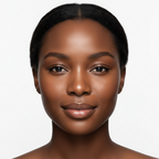Black woman with deeply hydrated calm glowing skin after using SKINFOOD Blue Chamomile Hyaluronic Ampoule
