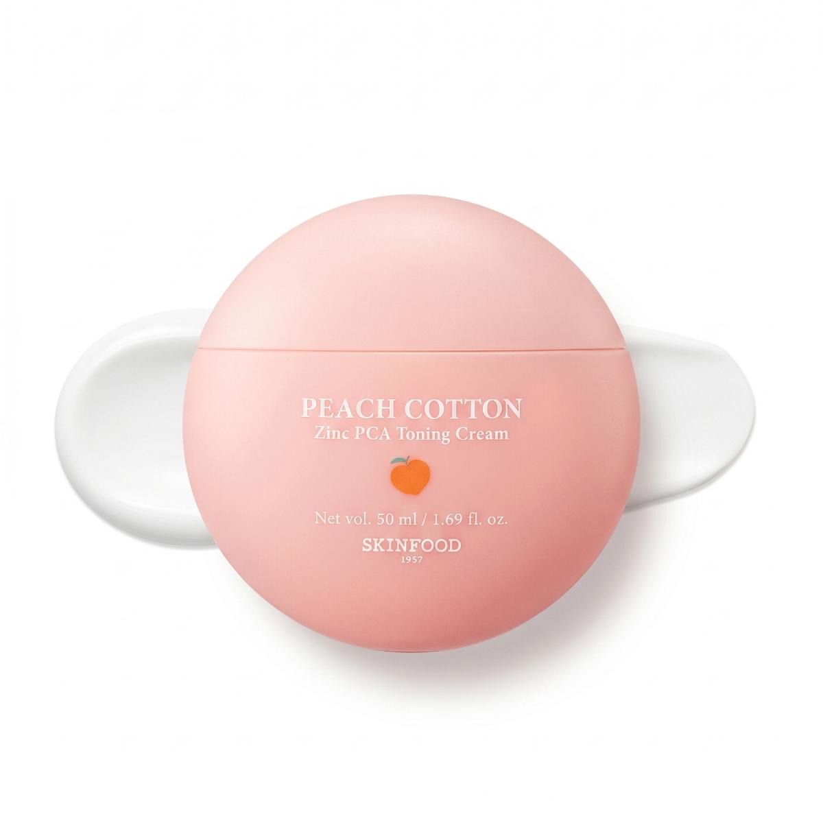 SKINFOOD Peach Cotton Zinc PCA Toning Cream 50ml — round peach-pink sphere jar with white wing handles on white background
