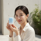COSRX Airy-Light Invisible Sun Stick SPF50+ PA++++ 19g – Korean model holding sun stick outdoors for broad-spectrum SPF50+ PA++++ invisible sun protection
