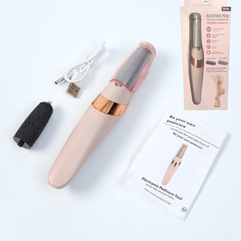 Pink electric pedicure callus remover pen with coarse roller head, USB cable, retail box and instruction manual – full set flat lay

