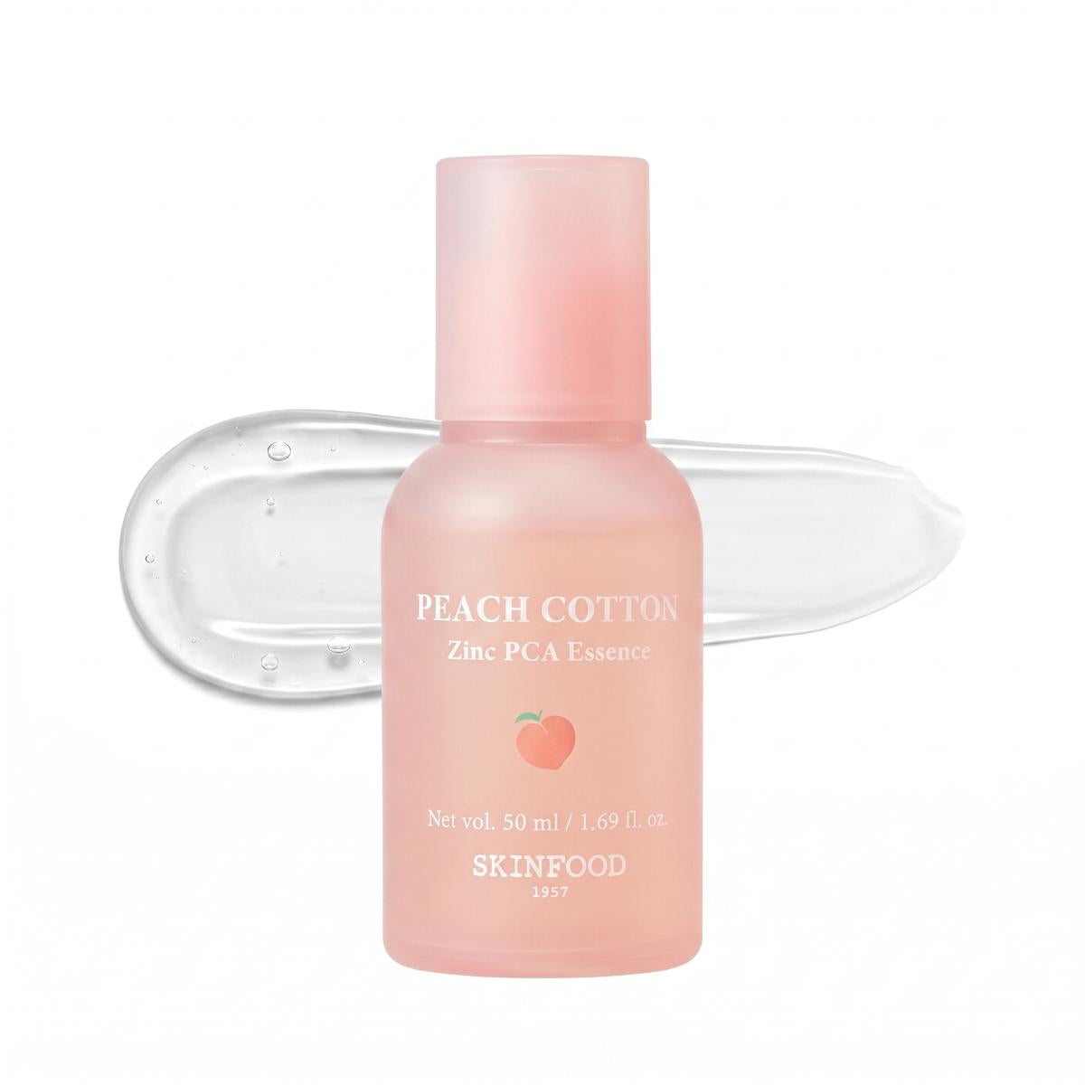 SKINFOOD Peach Cotton Zinc PCA Essence 50ml frosted pink bottle with clear gel swatch on white background
