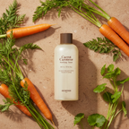 SKINFOOD Carrot Carotene Soothing Toner with fresh carrots carrot leaves and botanical ingredients flat lay
