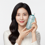 Korean woman holding BRINGGREEN Bamboo Hyalu Hydrating Toner aqua blue bottle, K-beauty editorial
