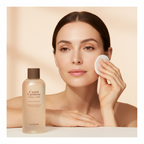 Caucasian woman applying SKINFOOD Carrot Carotene Soothing Toner with cotton pad to calm redness
